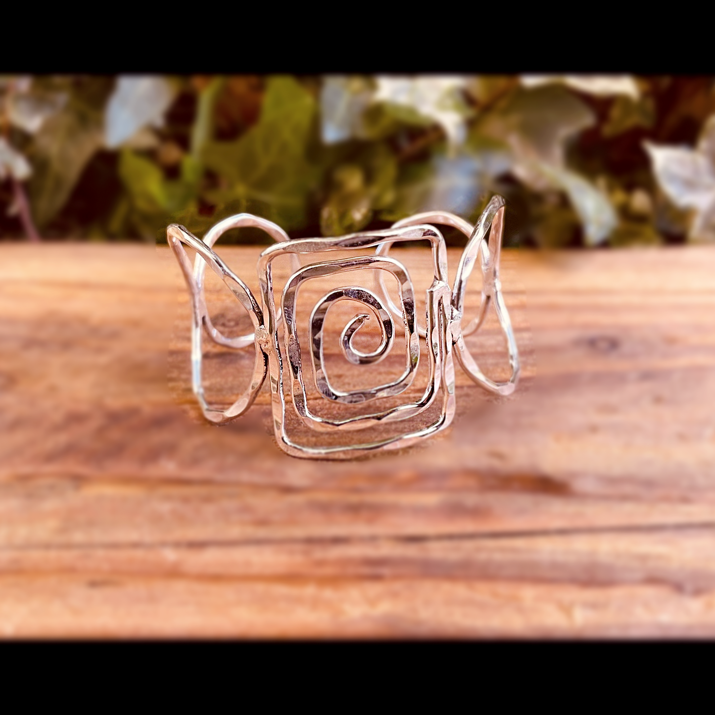 Bracciale spirale in argento martellato | regolabile | Fatto a mano
