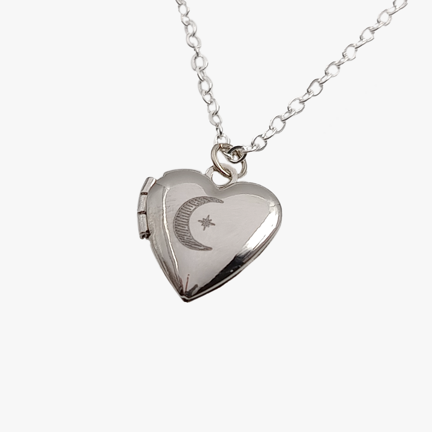 Piccolo medaglione a cuore | Luna e stella | Ottone argentato