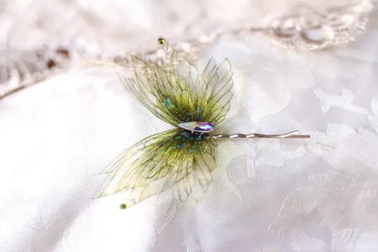 Accessorio fairycore con ali di fata verdi e dettagli iridescenti