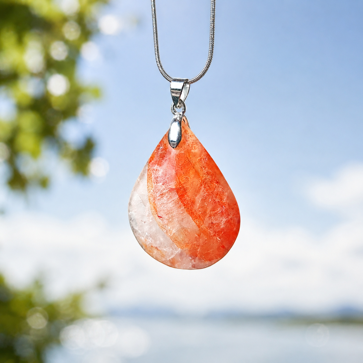 ollana con pietra naturale quarzo ematoide rosso e inclusioni arancio