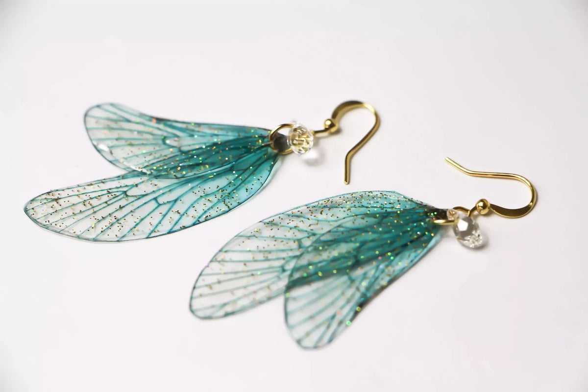 Orecchini ali di fata fairycore blu turchese con cristalli Swarovski