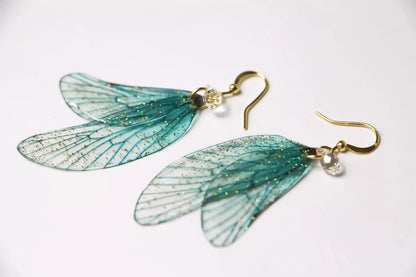 Orecchini ali di fata fairycore blu turchese con cristalli Swarovski
